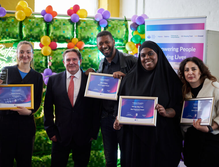 SIG staff members together with Mark Milton, CEO, to celebrate their SIG recognition Awards